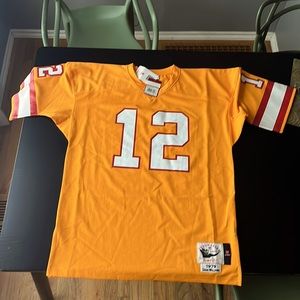 1979 Mitchell & Ness Doug Williams Throwback Jersey.  It’s orange.